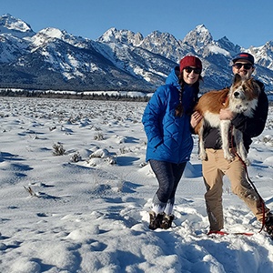 Dr. Cooper Adams, wife Chloe, and dog, Harper.