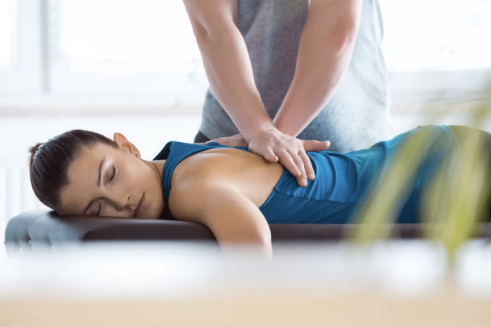 Patient receiving chiropractic treatment.